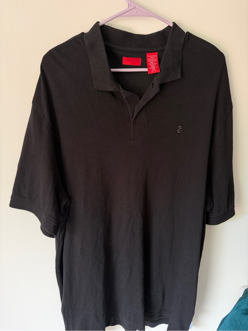Izod Black Polo Shirt with Subtle Embroidered Logo